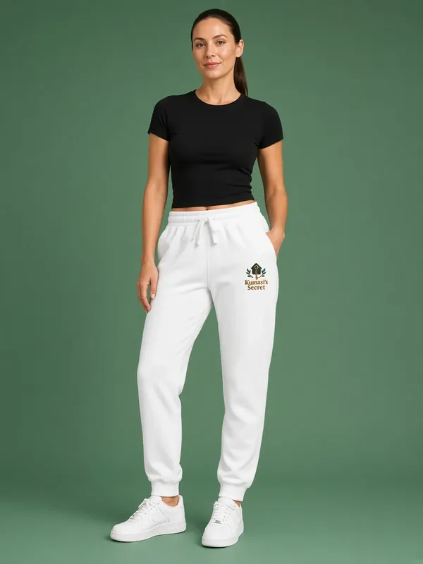 Model wearing the Kumasi's Secret white embroidered sweatpants, view 1